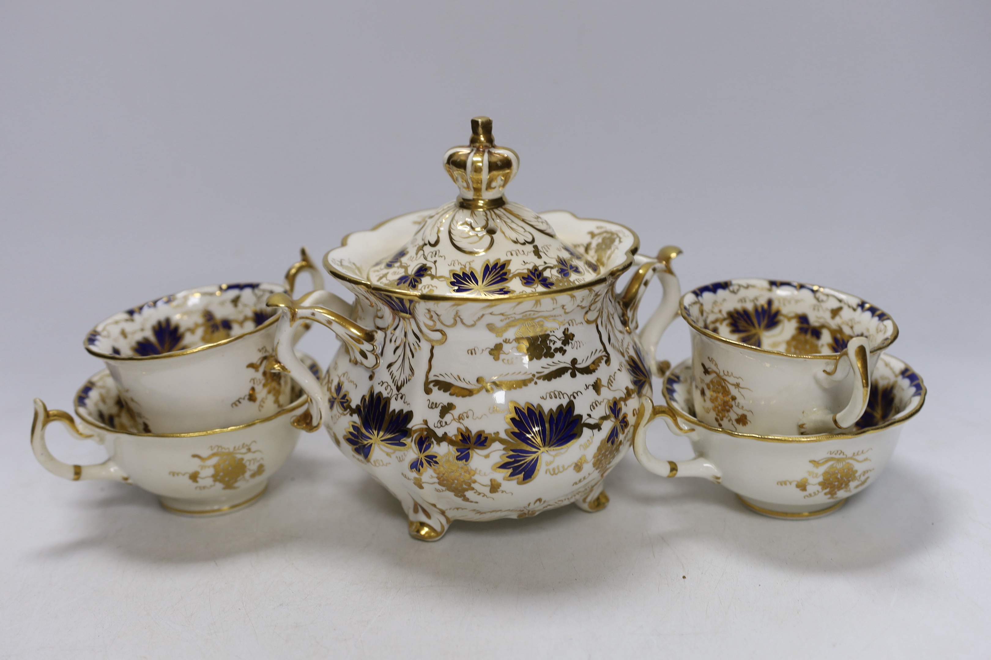 A mid 19th century Ridgeway style blue and gilt vine pattern twenty six piece part tea set